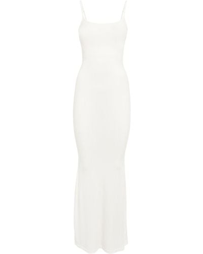 https://cdna.lystit.com/400/500/tr/photos/harrods/0c79576c/skims-white-Soft-Lounge-Long-Slip-Dress.jpeg