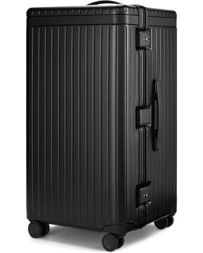 Carl Friedrik Trunk Spinner Check-in Suitcase (73cm) - Black