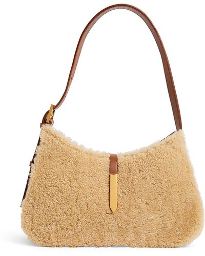5 Winter 2023 Bag Trends: Shearling, Crescent Bags, & More