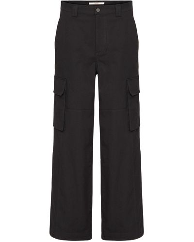 Valentino Garavani Rockstud-embellished tailored trousers - Black