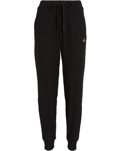 Alo Yoga Track pants and sweatpants for Women, Online Sale up to 37% off