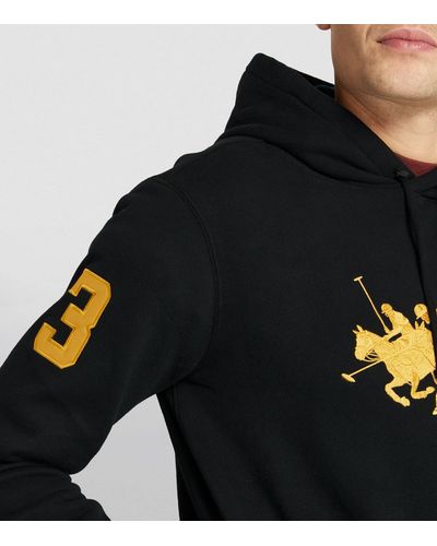 Black and best sale gold polo hoodie