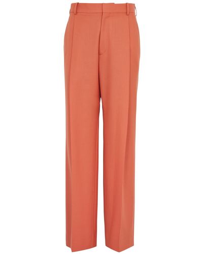 Victoria Beckham Pleated Tapered Twill Trousers - Orange