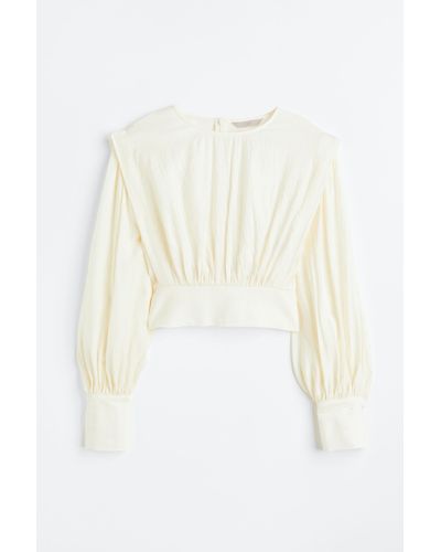 H&M Crêpe-Bluse mit betonten Schultern - Weiß