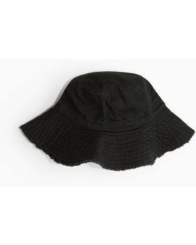 H&M Bucket Hat aus Baumwolle mit Fransenkante - Schwarz