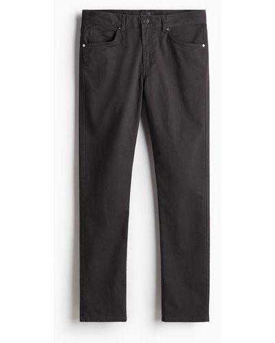 H&M Pantalon Slim Fit en twill de coton - Noir