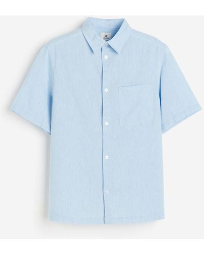 H&M Kurzarmhemd aus Leinenmix in Loose Fit - Blau