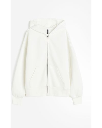 H&M Veste oversize zippée avec capuche - Blanc