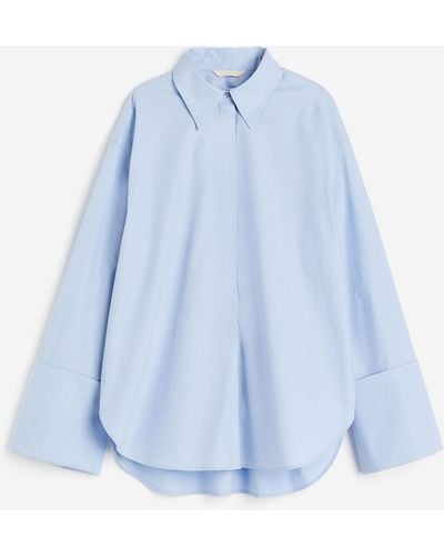 H&M Oversized Bluse mit breiten Manschetten - Blau