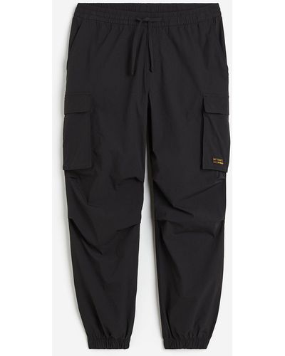 H&M Cargojoggers aus Nylon in Relaxed Fit - Schwarz