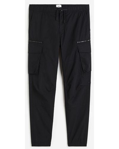 H&M Pantalon jogger cargo Regular Fit en tissu ripstop - Noir