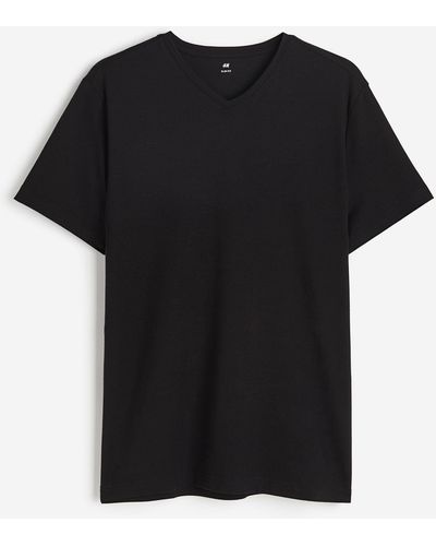 H&M T-Shirt mit V-Ausschnitt Slim Fit - Schwarz