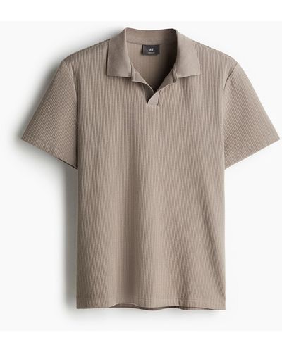 H&M Poloshirt mit Struktur in Regular Fit - Grau