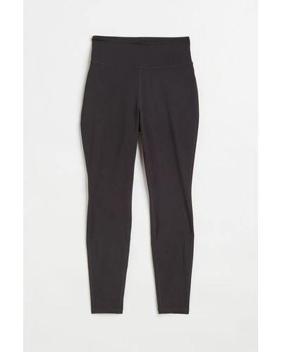 H&M DryMove Sporttights Curvy Fit - Schwarz