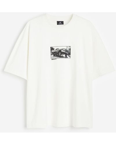 H&M Bedrucktes T-Shirt in Oversized Fit - Weiß