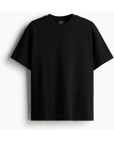 H&M T-Shirt in Loose Fit - Schwarz
