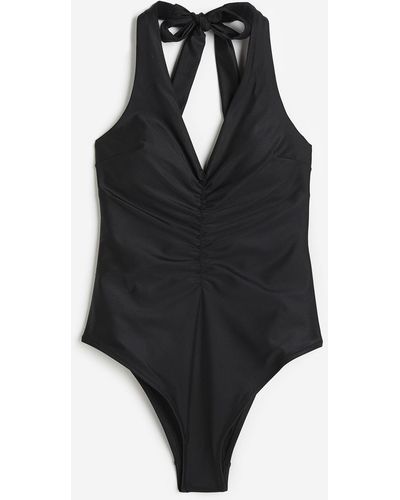 H&M Shape-Badeanzug mit hohem Beinausschnitt - Schwarz