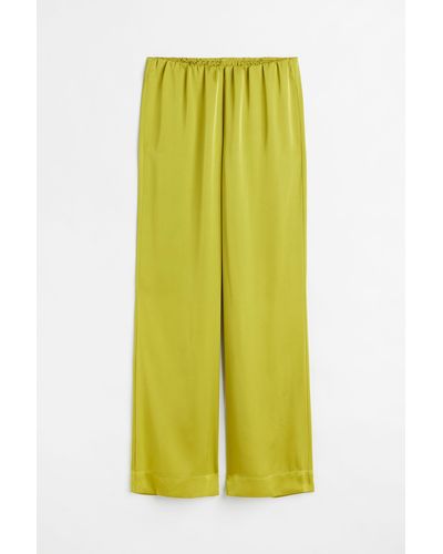 H&M Pantalon ample en satin - Jaune