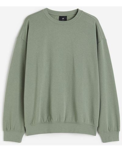 H&M Sweatshirt in Loose Fit - Grün