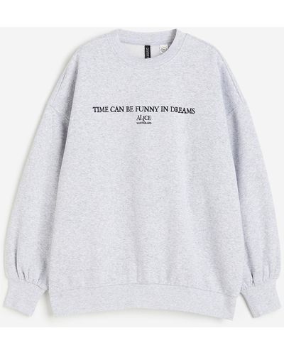 H&M Oversized Sweater Met Print - Wit