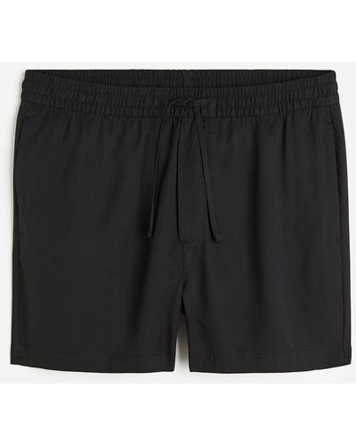 H&M Shorts aus Lyocell Regular Fit - Schwarz