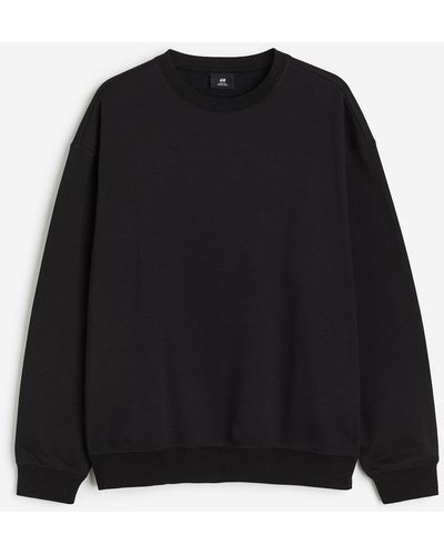 H&M Sweatshirt in Loose Fit - Schwarz