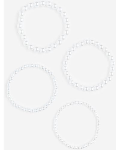 H&M Lot de 4 bracelets avec perles fantaisie - Blanc