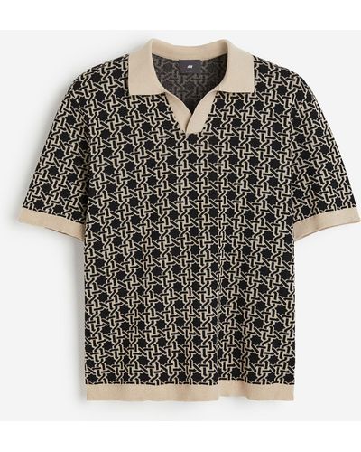 H&M Poloshirt aus Jacquardstrick in Regular Fit - Schwarz