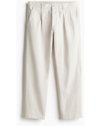H&M Cropped-Chino aus Baumwolle in Regular Fit - Weiß