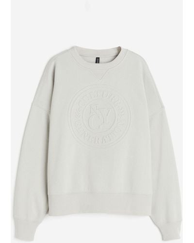 H&M Oversized Sweatshirt mit Motiv - Weiß