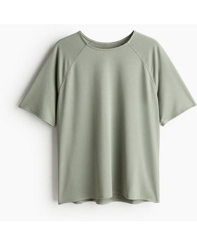 H&M DryMoveTM Sport-T-Shirt aus Mesh - Grün