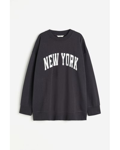 H&M Sweatshirt mit Print - Schwarz