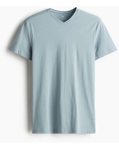 H&M T-Shirt mit V-Ausschnitt Slim Fit - Blau