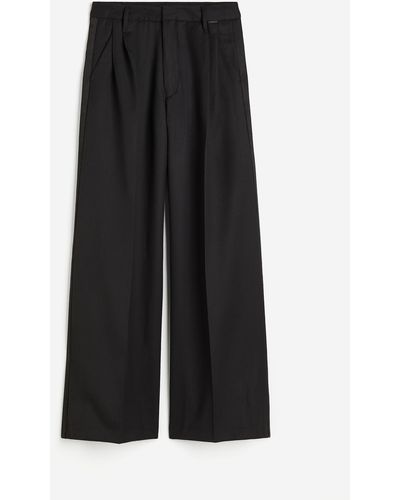 H&M Loose Pleated Holiday Pant Wmn - Schwarz