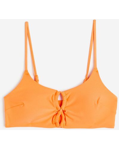H&M Wattiertes Bikinitop - Orange