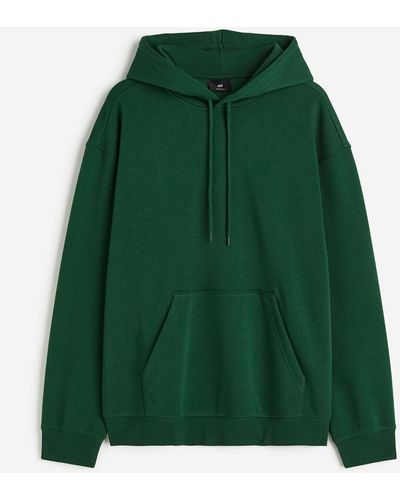 H&M Hoodie in Loose Fit - Grün