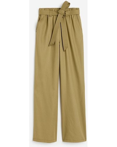 H&M Pantalon en lyocell avec ceinture à nouer - Vert