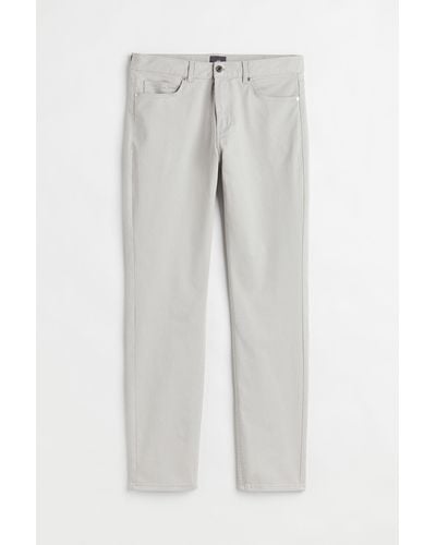 H&M Hose aus Baumwolltwill Slim Fit - Grau