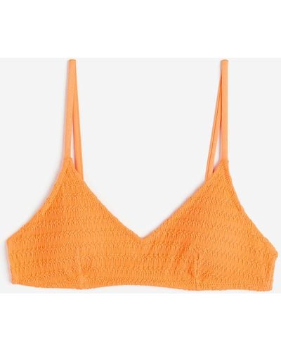 H&M Wattiertes Bikinitop - Orange