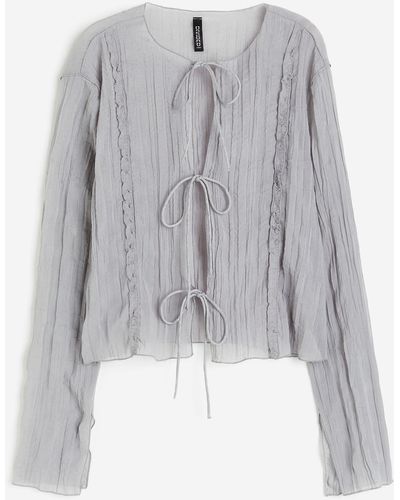 H&M Top vaporeux avec liens à nouer - Gris