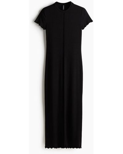 H&M Bodycon-Kleid mit Overlockdetail - Schwarz