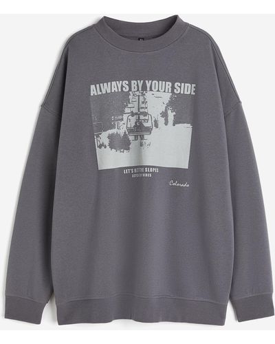 H&M Oversized Sweatshirt mit Motiv - Grau