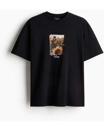 H&M Bedrucktes T-Shirt in Loose Fit - Schwarz