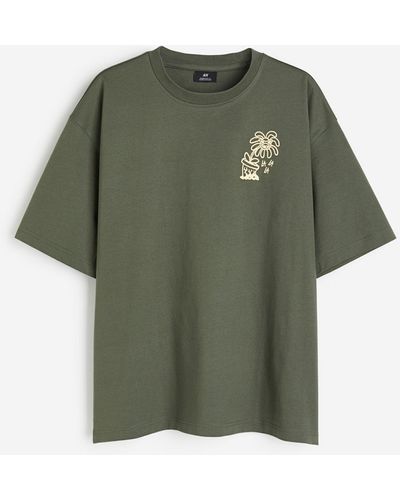 H&M Bedrucktes T-Shirt in Oversized Fit - Grün