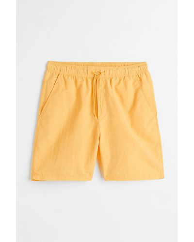 H&M Nylonshorts Relaxed Fit - Gelb