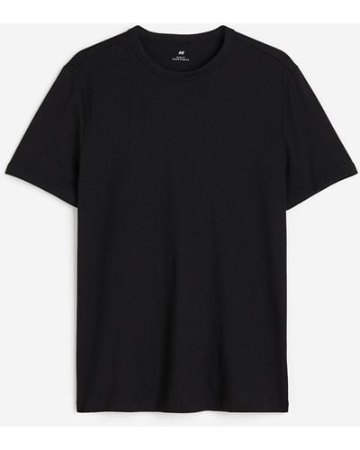 H&M Baumwoll-T-Shirt in Slim Fit - Schwarz