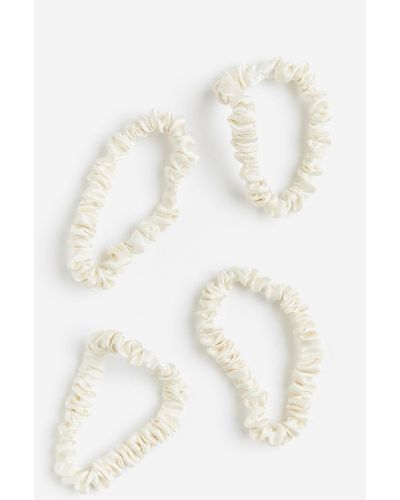 H&M 4er-Pack Scrunchies aus Seide - Weiß