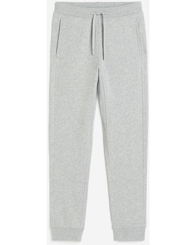 H&M Sport-Joggpants aus Baumwolle - Grau