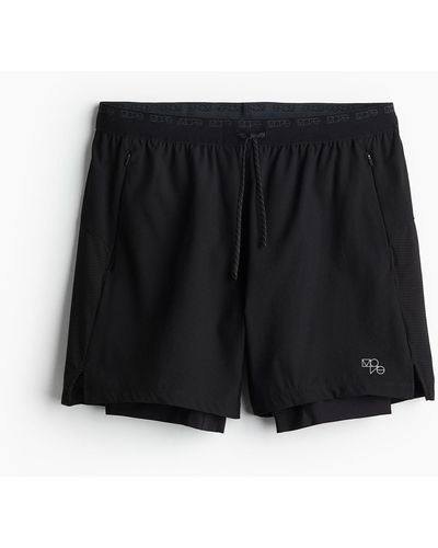 H&M DryMoveTM Double-layered running shorts - Schwarz