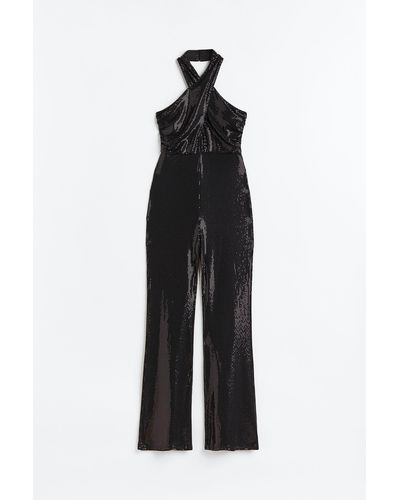 H&M Glitzernder Neckholder-Jumpsuit - Schwarz